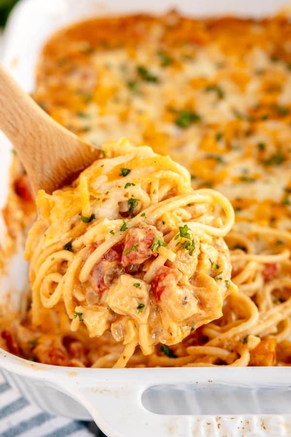 chicken spaghetti on a wooden spoon.