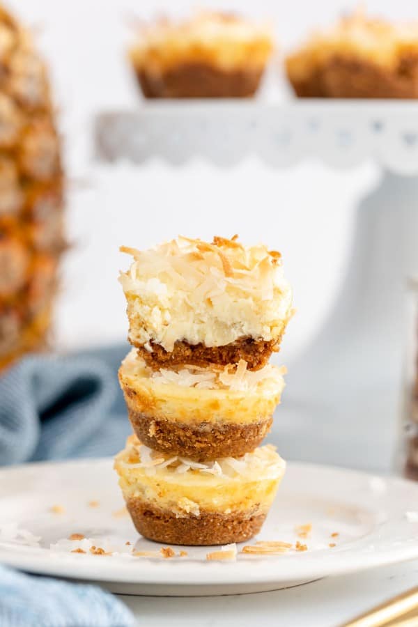 3 pineapple cheesecakes stacked.