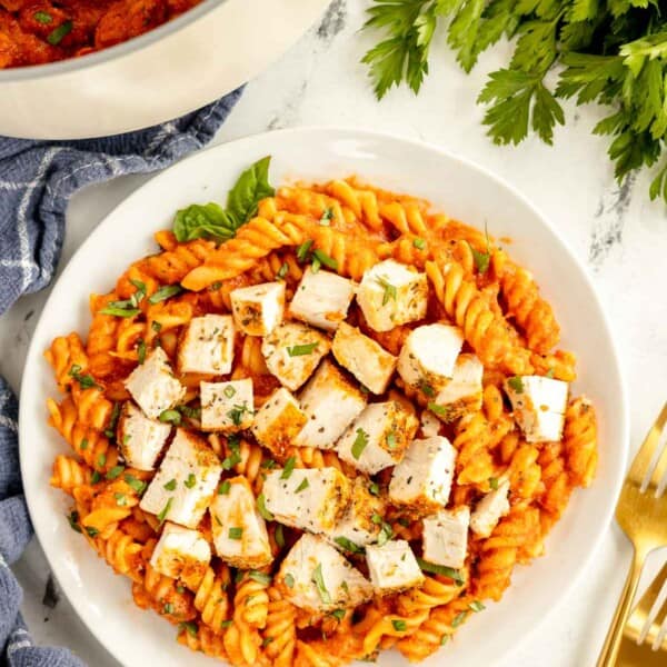 tomato chicken pasta in a bowl.