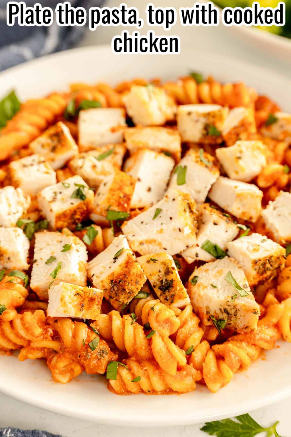 tomato chicken pasta in a bowl.