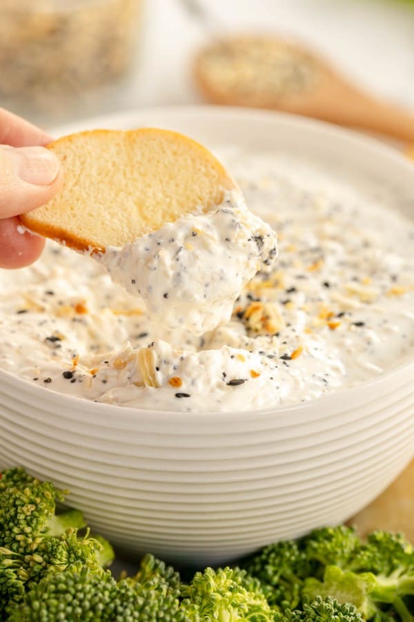 everything bagel dip on a bagel crisp.