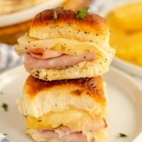 plate with hawaiian sliders stacked on it.