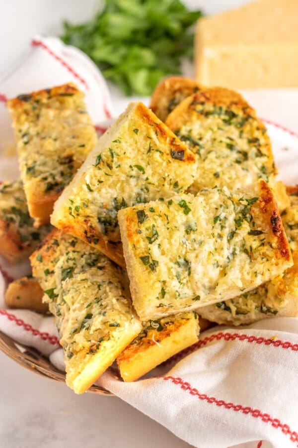 cut garlic bread in a basket