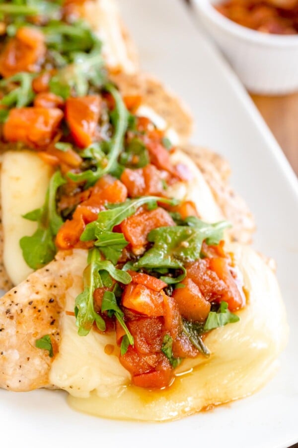 Italian Pork chops on a white platter