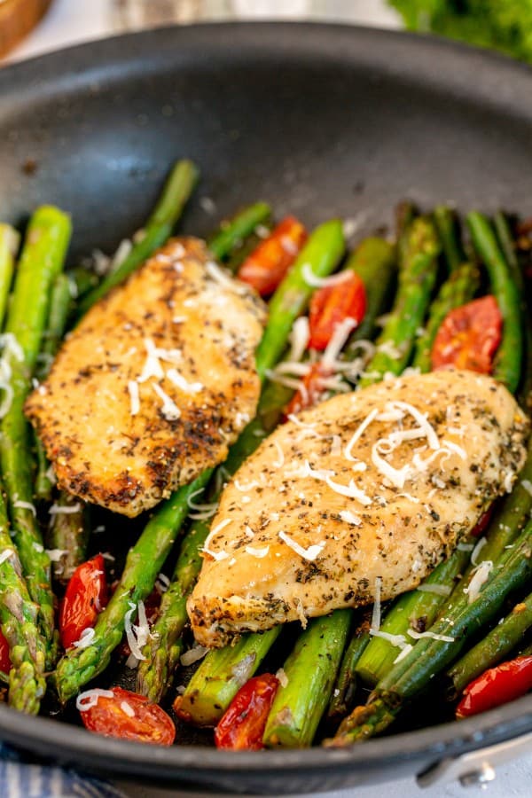 chicken and vegetables in a skillet.