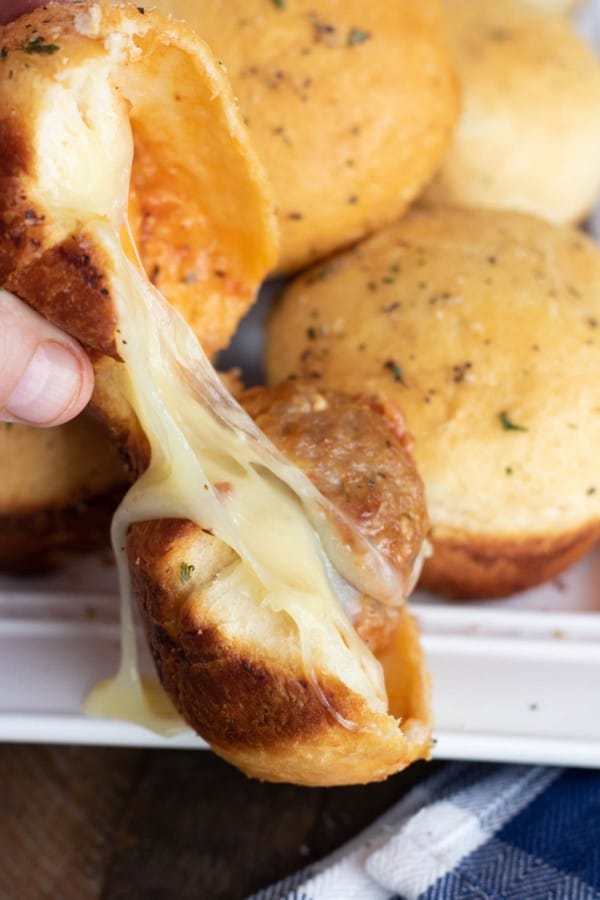meatball bomb cut open to show the cheese.
