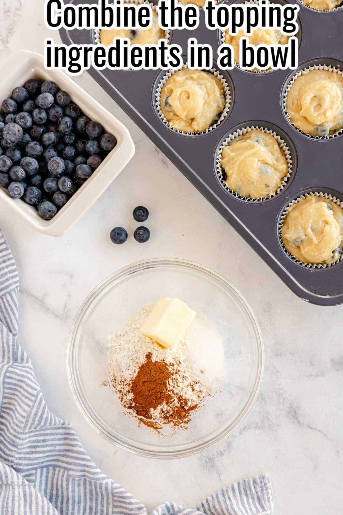 a glass bowl with streusel ingredients in it.