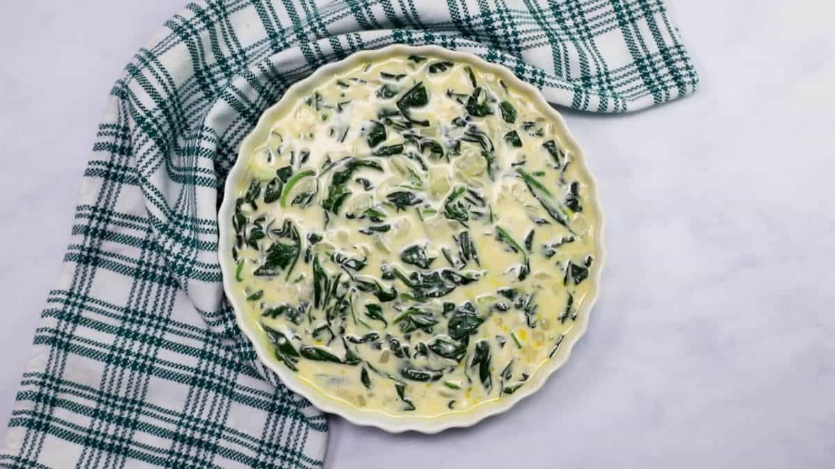 quiche batter in a tart pan, unbaked.