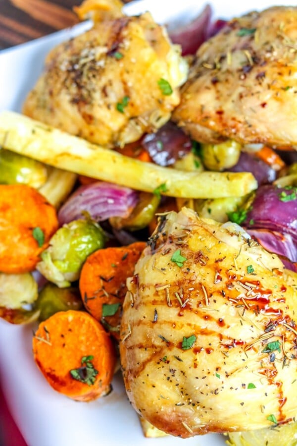 Roast Chicken with Vegetables on a white plate
