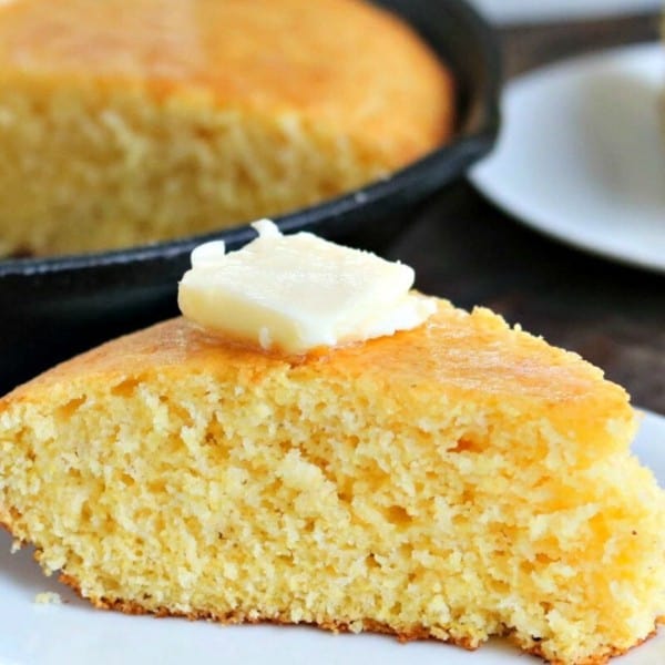 slice of cornbread on a white plate